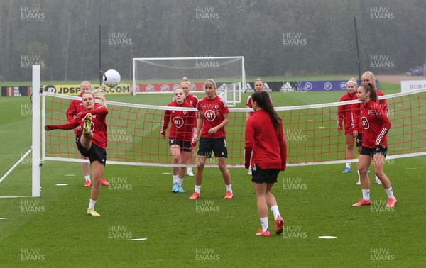 191021 - Wales Women Football Training - Wales Women squad members warm up during a training session ahead of their World Cup Qualifying matches against Slovenia and Estonia