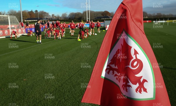 231121 - Wales Women Football Training - Wales Women squad warm up in the sunshine during a training session ahead of their World Cup qualifying match against Greece