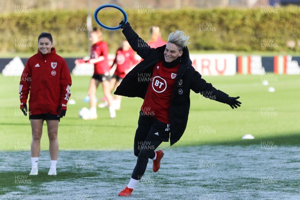 261120 - Wales Women Football Training session - Jess Fishlock celebrates after catching a disc in warm up during a training session ahead of their Women's European Championship Qualifying match against Belarus on the 1st December