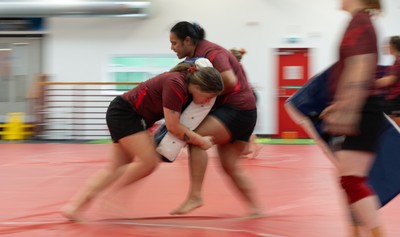 140426 - Wales Women Gym and Dojo Training session - Sisilia Tuipulotu and Maisie Davies during a gym and dojo training session ahead of their match against France 