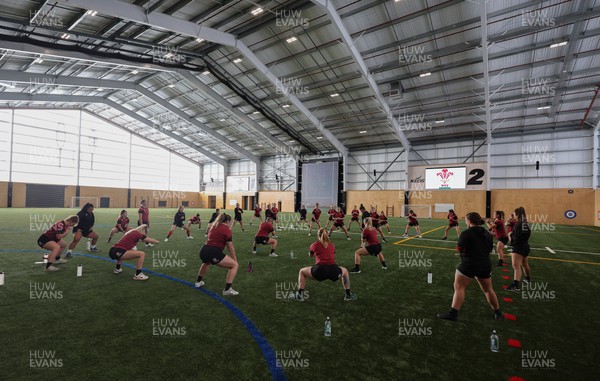 131023 - Wales Women Conditioning Session - Members of the Wales Women’s squad warm up during a gym session on their first full day in Wellington, New Zealand ahead of the start of WXV1