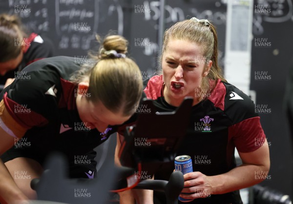 120324 - Wales Women Bike session -  Lisa Neumann encourages Carys Cox during a bike session ahead of the start of the Women’s 6 Nations