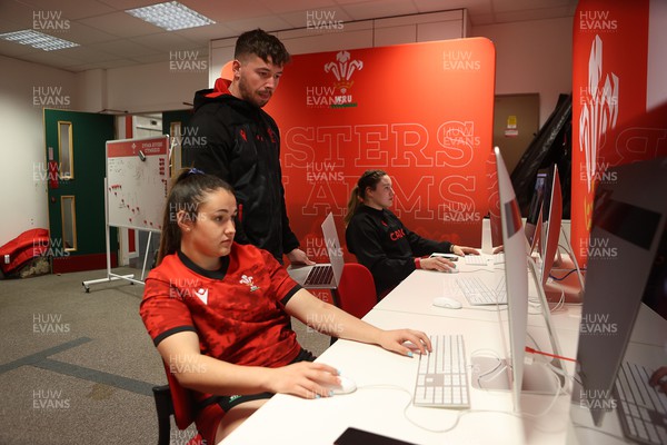 220222 - Behind the scenes with the Wales Women National Rugby team at the National Centre of Excellence at the Vale Resort Hotel - Kayleigh Powell and Glen Crabb doing analysis with Adam Fuge
