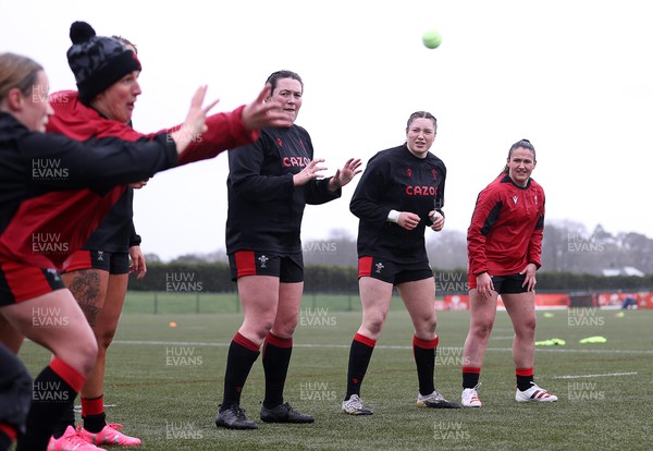 220222 - Behind the scenes with the Wales Women National Rugby team at the National Centre of Excellence at the Vale Resort Hotel - Cerys Hale, Gwen Crabb and Kayleigh Powell during training