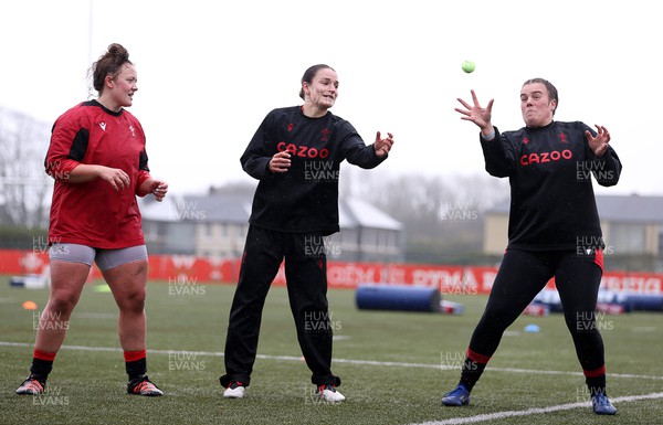 220222 - Behind the scenes with the Wales Women National Rugby team at the National Centre of Excellence at the Vale Resort Hotel - Lleucu George, Jasmine Joyce and Carys Phillips during training