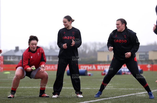 220222 - Behind the scenes with the Wales Women National Rugby team at the National Centre of Excellence at the Vale Resort Hotel - Lleucu George, Jasmine Joyce and Carys Phillips during training
