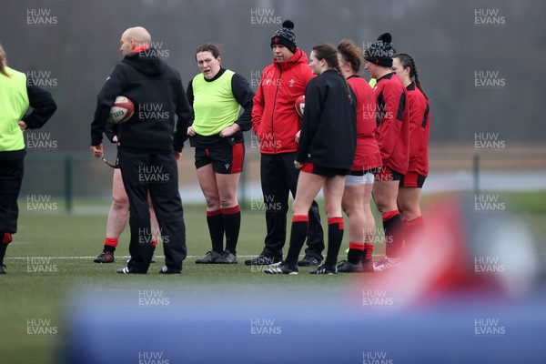220222 - Behind the scenes with the Wales Women National Rugby team at the National Centre of Excellence at the Vale Resort Hotel - Head Coach Ioan Cunningham during training