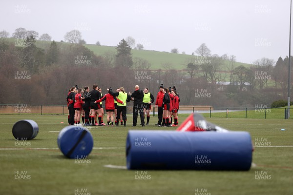 220222 - Behind the scenes with the Wales Women National Rugby team at the National Centre of Excellence at the Vale Resort Hotel - Team huddle