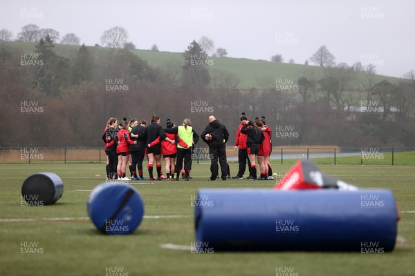 220222 - Behind the scenes with the Wales Women National Rugby team at the National Centre of Excellence at the Vale Resort Hotel - Team huddle