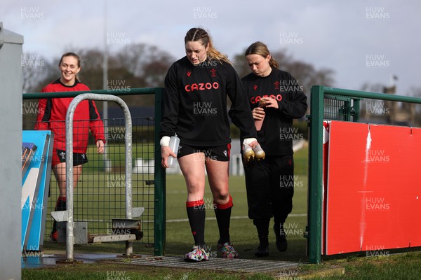 220222 - Behind the scenes with the Wales Women National Rugby team at the National Centre of Excellence at the Vale Resort Hotel - Gwen Crabb and Alisha Butchers leave training