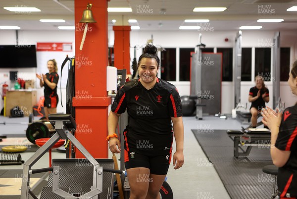 220222 - Behind the scenes with the Wales Women National Rugby team at the National Centre of Excellence at the Vale Resort Hotel - Sisilia Tuipulotu rings the PB bell