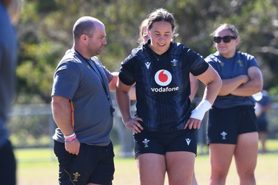 250725 - Wales Women Rugby Team Run at Surfers Paradise Rugby Club - Sean Lynn, Wales Women head coach with Katherine Baverstock during Wales’ Captains Run ahead of the first test match against Australia