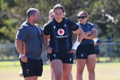 250725 - Wales Women Rugby Team Run at Surfers Paradise Rugby Club - Sean Lynn, Wales Women head coach with Katherine Baverstock during Wales’ Captains Run ahead of the first test match against Australia