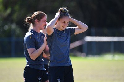 250725 - Wales Women Rugby Team Run at Surfers Paradise Rugby Club - Hannah Dallavalle and Lisa Neumann during Wales’ Captains Run ahead of the first test match against Australia