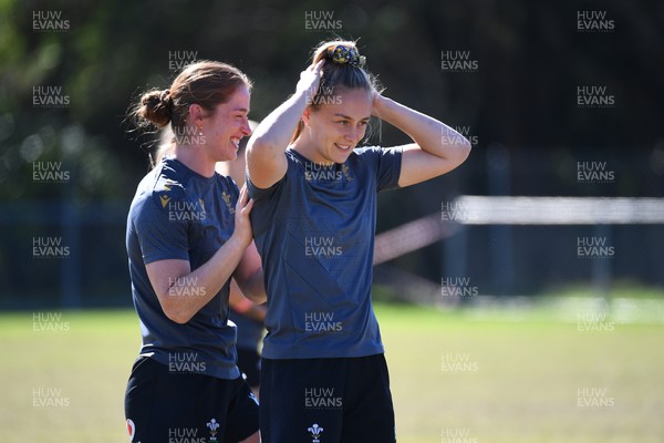 250725 - Wales Women Rugby Team Run at Surfers Paradise Rugby Club - Hannah Dallavalle and Lisa Neumann during Wales’ Captains Run ahead of the first test match against Australia