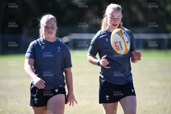 250725 - Wales Women Rugby Team Run at Surfers Paradise Rugby Club - Seren Lockwood and Catherine Richards during Wales’ Captains Run ahead of the first test match against Australia