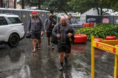 310725 - Wales Women Rugby Captain’s Run - Sean Lynn, Wales Women head coach arrives in the rain for Wales’ Captain’s Run ahead of the second test against Australia