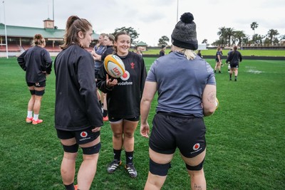 310725 - Wales Women Rugby Captain’s Run - Kate Williams, Lleucu George and Alex Callender during Wales’ Captain’s Run ahead of the second test against Australia