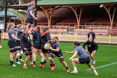 310725 - Wales Women Rugby Captain’s Run - Bethan Lewis breaks during Wales’ Captain’s Run ahead of the second test against Australia