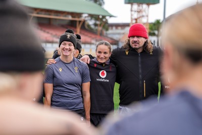 310725 - Wales Women Rugby Captain’s Run - Carys Cox, Jasmine Joyce and Dan Murphy, Wales Women defence coach, during Wales’ Captain’s Run ahead of the second test against Australia