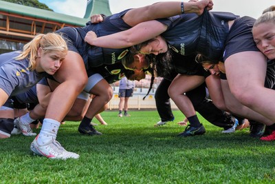 310725 - Wales Women Rugby Captain’s Run - The Wales team scrum down during Wales’ Captain’s Run ahead of the second test against Australia