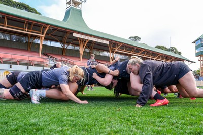 310725 - Wales Women Rugby Captain’s Run - The Wales team scrum down during Wales’ Captain’s Run ahead of the second test against Australia