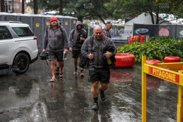 310725 - Wales Women Rugby Captain’s Run - Sean Lynn, Wales Women head coach arrives in the rain for Wales’ Captain’s Run ahead of the second test against Australia