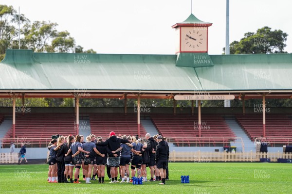 310725 - Wales Women Rugby Captain’s Run - The Wales team huddle up during Wales’ Captain’s Run ahead of the second test against Australia
