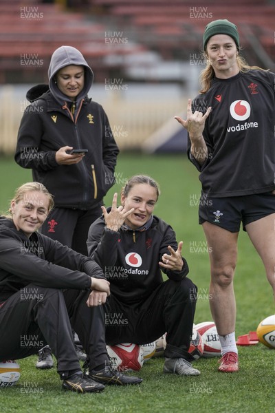 310725 - Wales Women Rugby Captain’s Run - Hannah Dallavalle, Cara Jones, Jasmine Joyce and Lisa Neumann during Wales’ Captain’s Run ahead of the second test against Australia