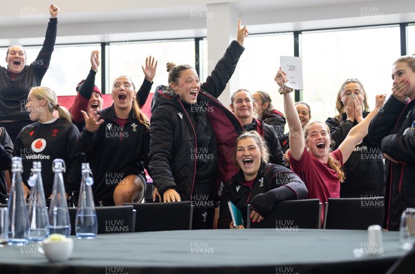301023 - Wales Women Rugby Match Review - Wales Women’s squad celebrate after Keira Bevan wins a team challenge ahead of a match review of the game against New Zealand after they arrive in Auckland 