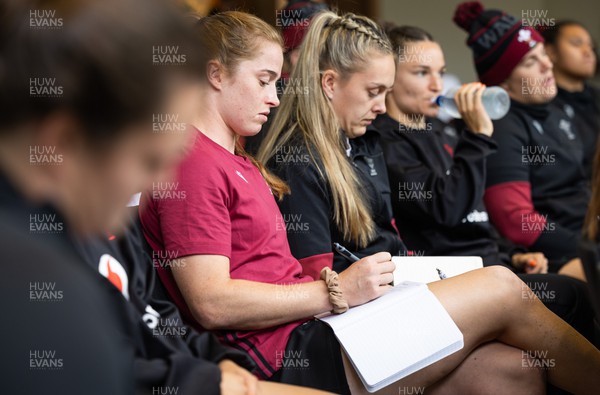 301023 - Wales Women Rugby Match Review - Lisa Neumann, Hannah Jones and Jazz Joyce during a match review of the game against New Zealand after they arrive in Auckland 