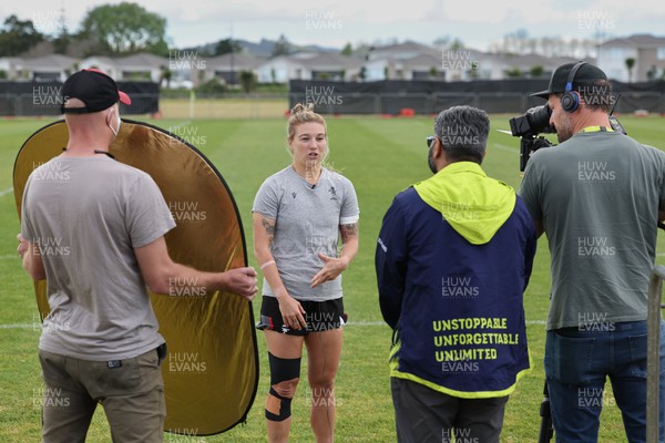 111022 - Wales Women Rugby Training Session - Wales’ Keira Bevan is interviewed by World Rugby after a training session ahead of their Women’s Rugby World Cup match against New Zealand