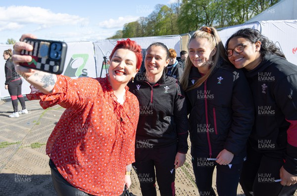 190424 - Wales Women Rugby Media session - Bronwen Lewis with Wales international stars Kayleigh Powell, Hannah Jones and Sisilia Tuipulotu during a media session held at the Urdd WRU 7s ahead of Wales’ Guinness 6 Nations match against France
