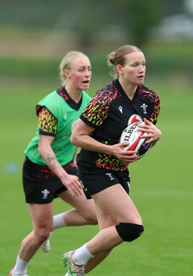 010426 - Wales Women Rugby Training Session - Carys Cox and Nikita Prothero during training ahead of the start of the Women’s 6 Nations