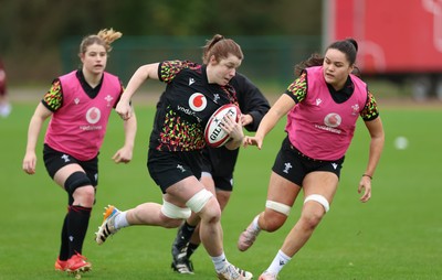 010426 - Wales Women Rugby Training Session - Kate Williams with Jorja Aiono during training ahead of the start of the Women’s 6 Nations