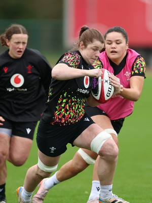 010426 - Wales Women Rugby Training Session - Kate Williams with Jorja Aiono during training ahead of the start of the Women’s 6 Nations