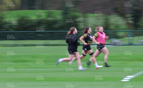 010426 - Wales Women Rugby Training Session - Gwenllian Pyrs, Branwen Metcalfe and Maisie Davies during training ahead of the start of the Women’s 6 Nations