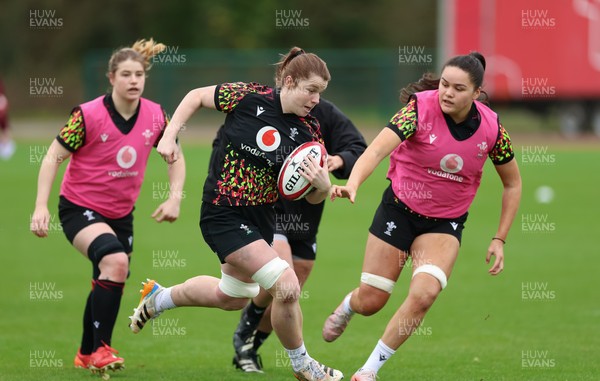 010426 - Wales Women Rugby Training Session - Kate Williams with Jorja Aiono during training ahead of the start of the Women’s 6 Nations