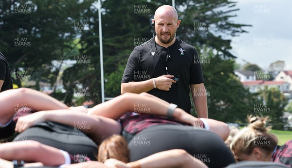 011123 - Wales Women Rugby Training Session - Forwards Coach Mike Hill works with the forwards on scrummaging during a training session ahead of their final WXV1 match against Australia