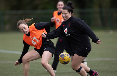 020424 - Wales Women’s Rugby Training Session - Jenny Hesketh and Shona Wakley warm up with a game of football during a training session ahead of Wales’ next Women’s 6 Nations match against Ireland