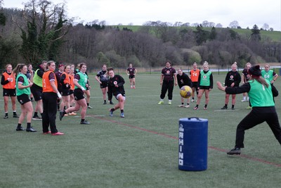 020424 - Wales Women’s Rugby Training Session - Hannah Bluck scores a penalty as the team warms up with a game of football during a training session ahead of Wales’ next Women’s 6 Nations match against Ireland