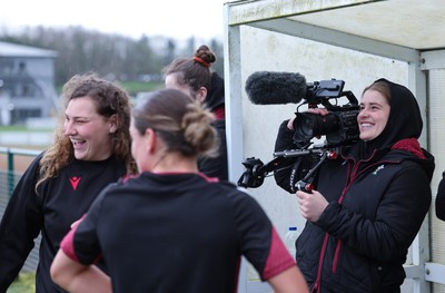 020424 - Wales Women’s Rugby Training Session - Bethan Lewis tries her hand a videography during a training session ahead of Wales’ next Women’s 6 Nations match against Ireland