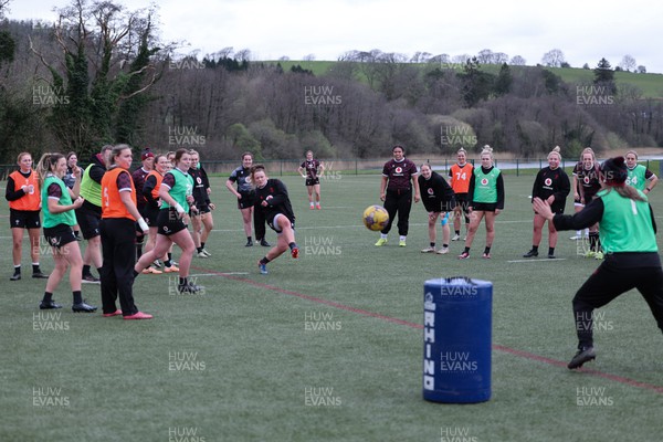 020424 - Wales Women’s Rugby Training Session - Hannah Bluck scores a penalty as the team warms up with a game of football during a training session ahead of Wales’ next Women’s 6 Nations match against Ireland