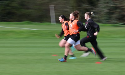 040424 - Wales Women’s Rugby Training Session - Sian Jones, Lleucu George and Mollie Wilkinson during training session ahead of Wales’ next Women’s 6 Nations match against Ireland