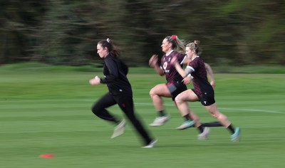 040424 - Wales Women’s Rugby Training Session - Nel Metcalfe, Kerin Lake and Keira Bevan during training session ahead of Wales’ next Women’s 6 Nations match against Ireland