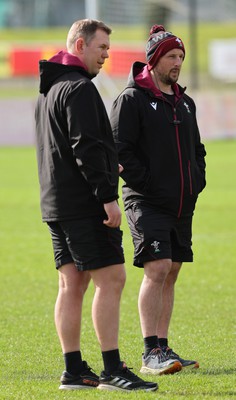 040424 - Wales Women’s Rugby Training Session - Ioan Cunningham, Wales Women head coach, and Mike Hill, Wales Women forwards coach, during training session ahead of Wales’ next Women’s 6 Nations match against Ireland