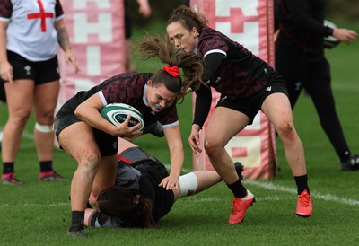 040424 - Wales Women’s Rugby Training Session - Bryonie King and Jenny Hesketh during training session ahead of Wales’ next Women’s 6 Nations match against Ireland