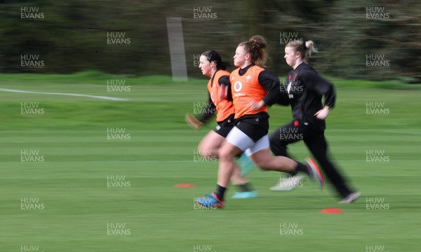 040424 - Wales Women’s Rugby Training Session - Sian Jones, Lleucu George and Mollie Wilkinson during training session ahead of Wales’ next Women’s 6 Nations match against Ireland