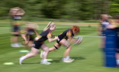 050526 - Wales Women Rugby Training Session - Georgia Evans and Seren Lockwood during training ahead of the 6 Nations match against Ireland