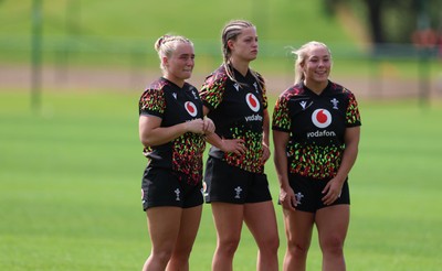050526 - Wales Women Rugby Training Session - Left to right, Seren Singleton, Amy Williams and Kelsie Webster during training ahead of the 6 Nations match against Ireland